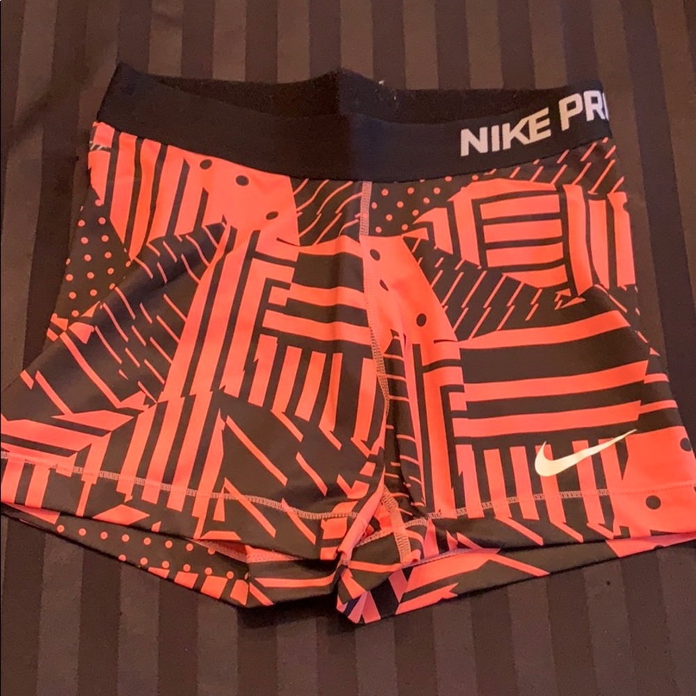 Pink and Black Nike Pro Spandex